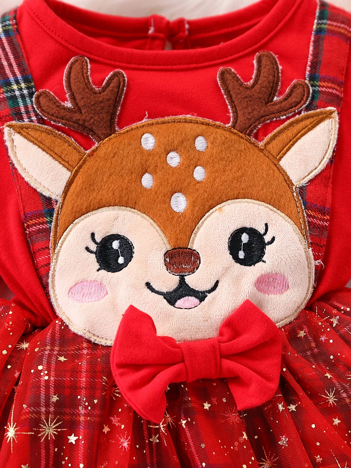 Festive Christmas dress with reindeer appliqué and plaid tulle skirt — perfect for holiday moments