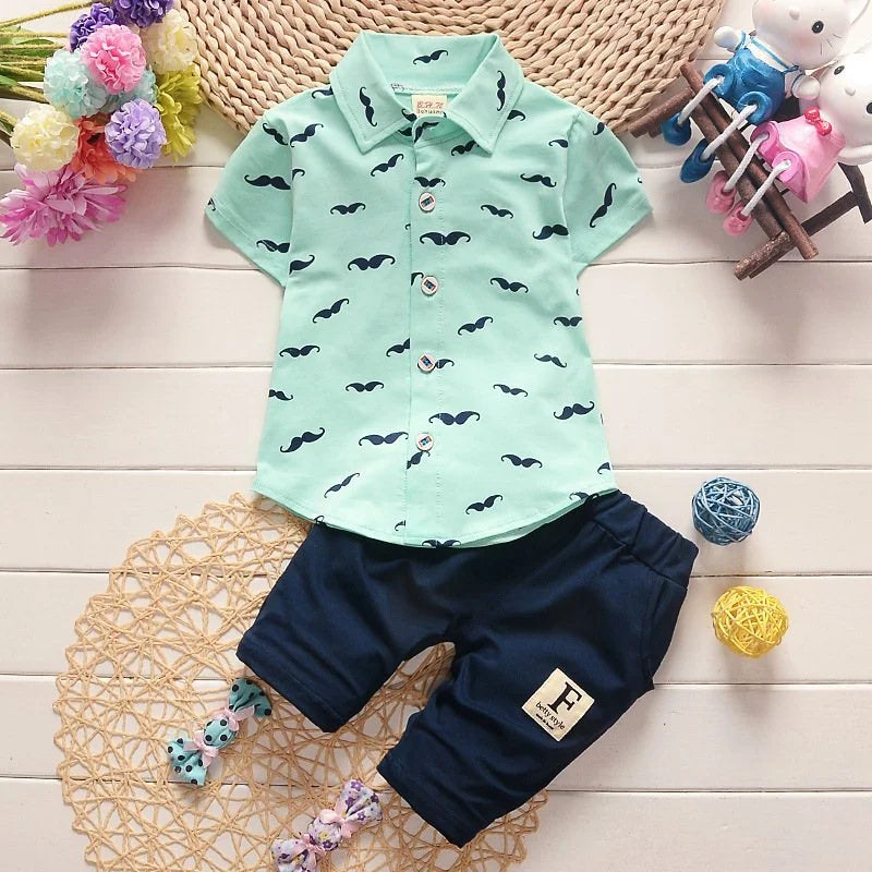 Cute summer outfit for boys — printed short‑sleeve shirt & matching cotton shorts. Perfect for warm days