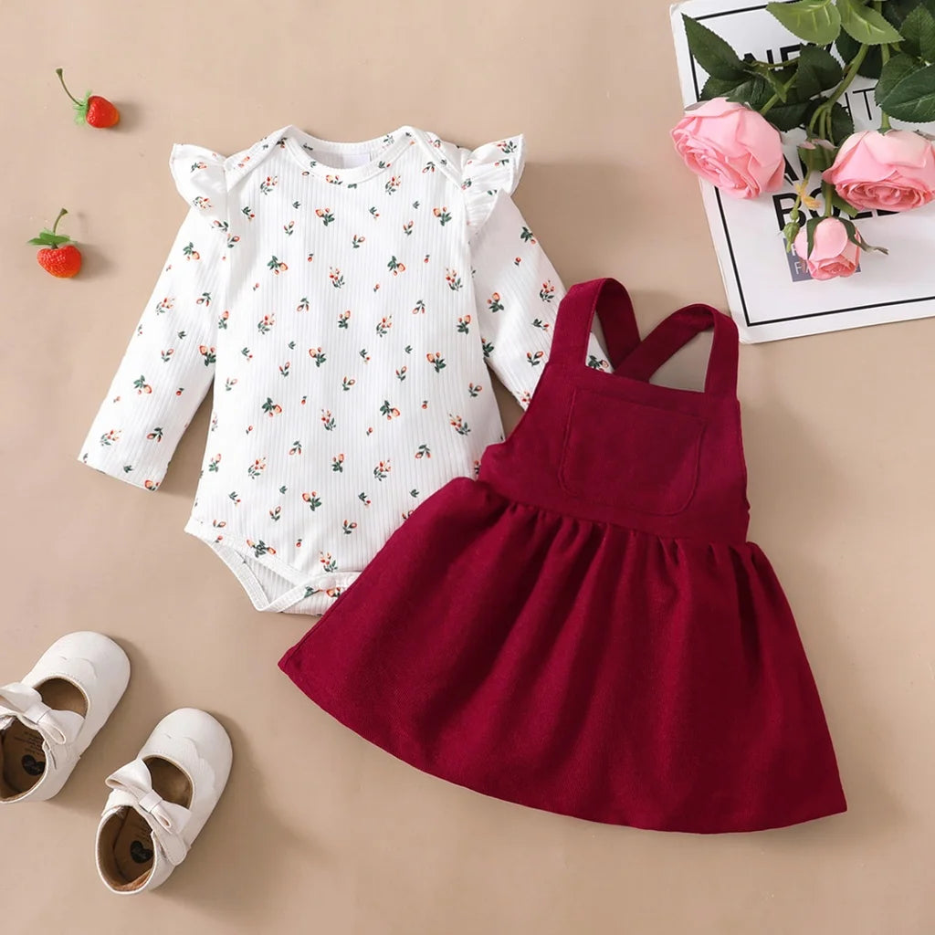 Cute 2-piece romper and red skirt set — perfect for festive baby moments