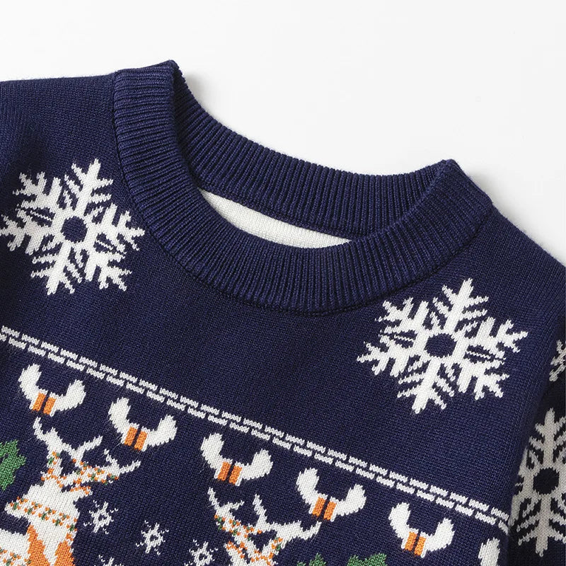 Cosy Christmas knitted sweatshirt for boys and girls, made from soft cotton knit with a relaxed fit. Shop now and keep them warm in festive style