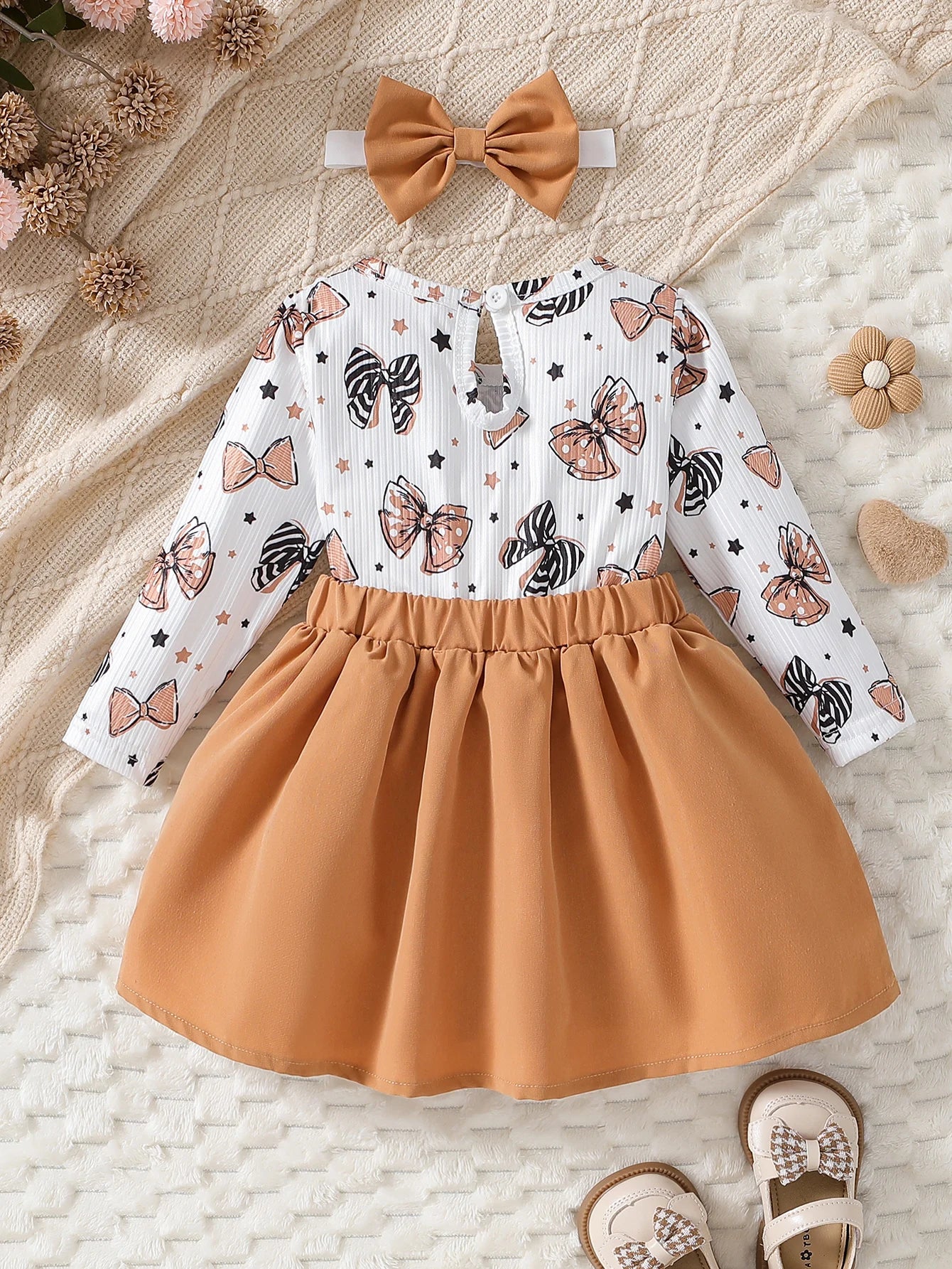 Baby girl cute cartoon bow pattern in spring and autumn, round neck long sleeved ruffle edge fake two-piece spliced dress