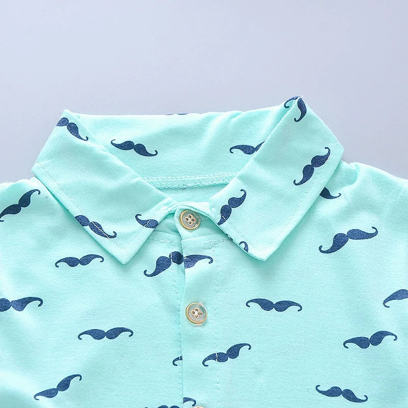 Cute summer outfit for boys — printed short‑sleeve shirt & matching cotton shorts. Perfect for warm days