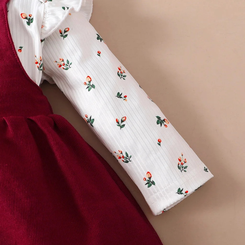 Cute 2-piece romper and red skirt set — perfect for festive baby moments