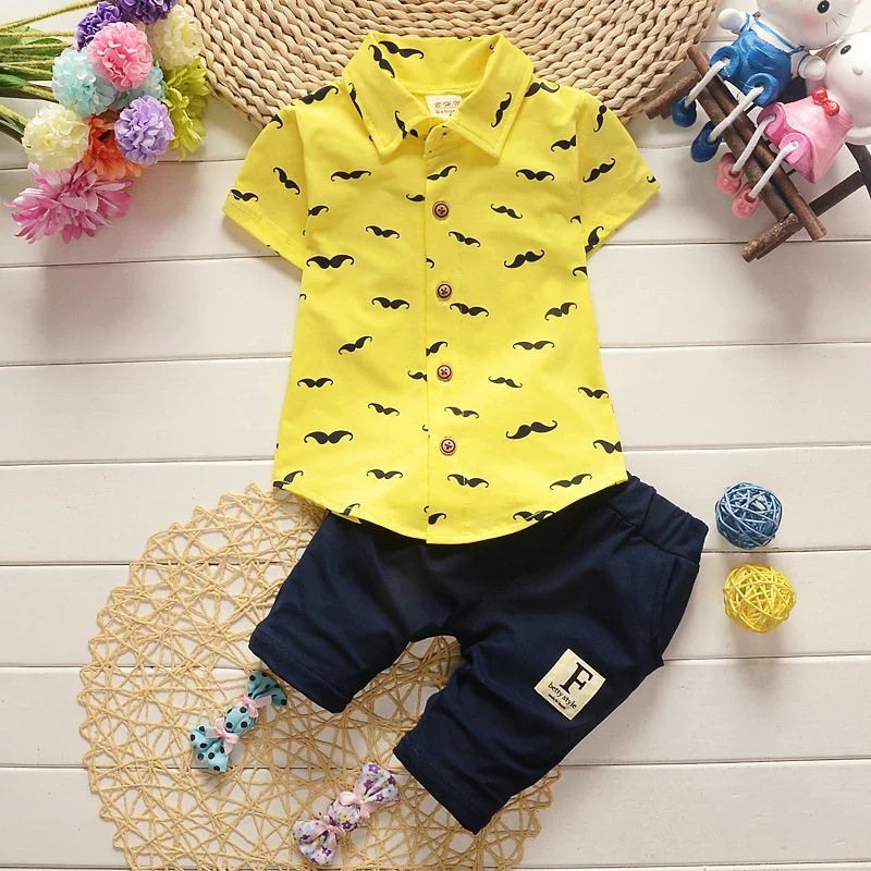Cute summer outfit for boys — printed short‑sleeve shirt & matching cotton shorts. Perfect for warm days