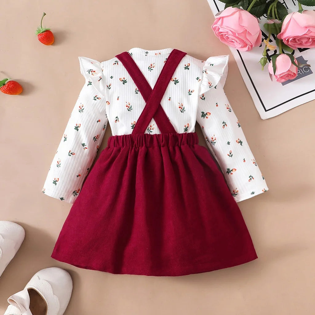 Cute 2-piece romper and red skirt set — perfect for festive baby moments